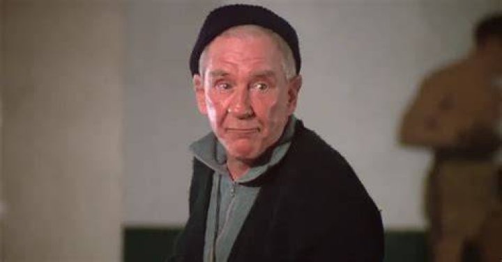 Burgess Meredith as Mickey in Rocky
