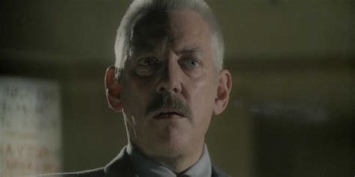 Donald Sutherland as Warden Samuel Norton in The Shawshank Redemption (1984)