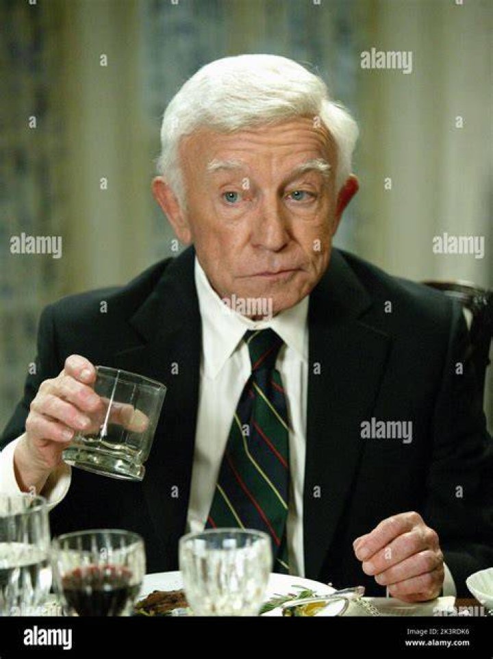 Henry Gibson as Father O'Neil in Wedding Crashers (1980s)