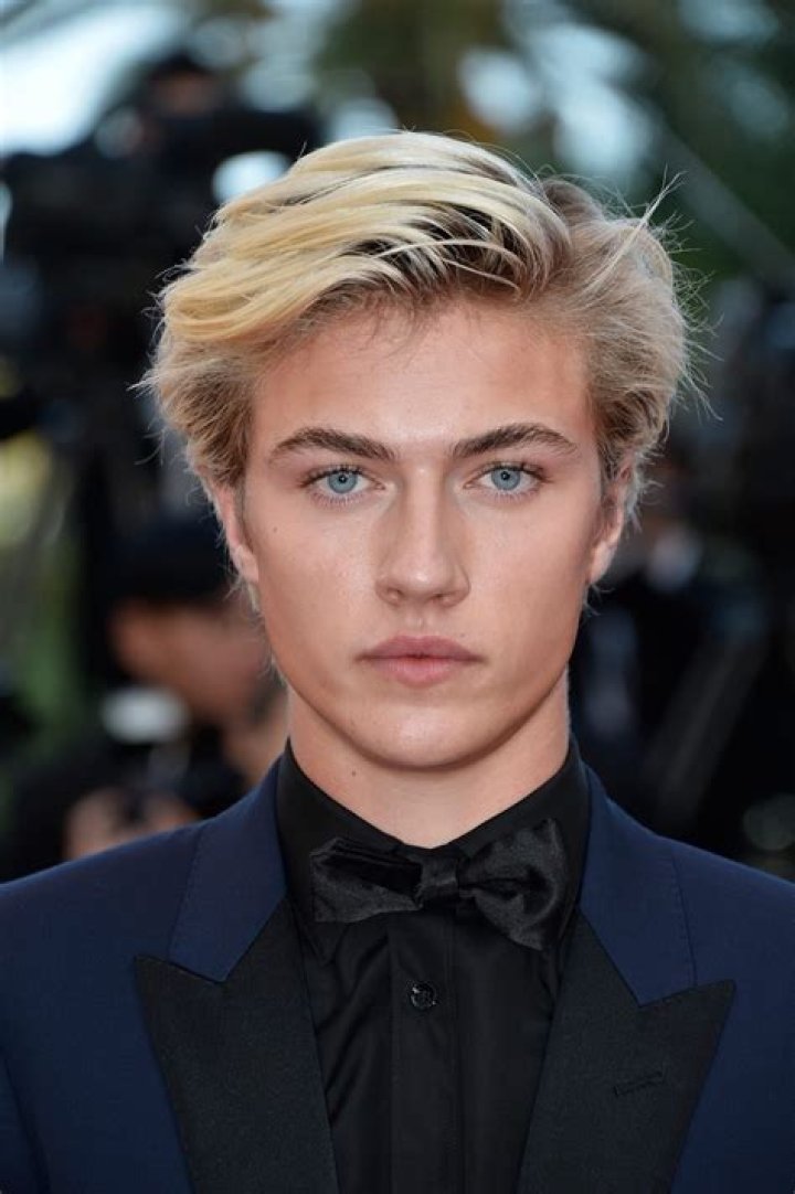 Lucky Blue Smith as Peeta Mellark in The Hunger Games Trilogy
