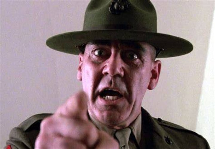 R. Lee Ermey as Dean Vernon Wormer in National Lampoon's Animal House (1988)
