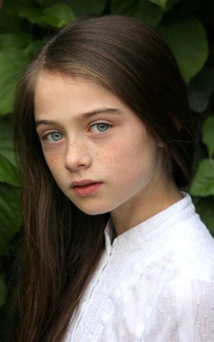 Raffey Cassidy as Young Claire in Resident Evil