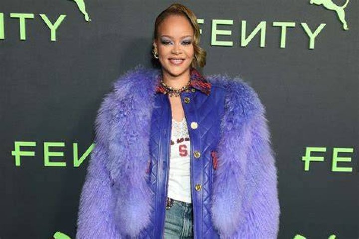 Rihanna spills out of purple bra as she admits she&rsquo;s &lsquo;usually humble