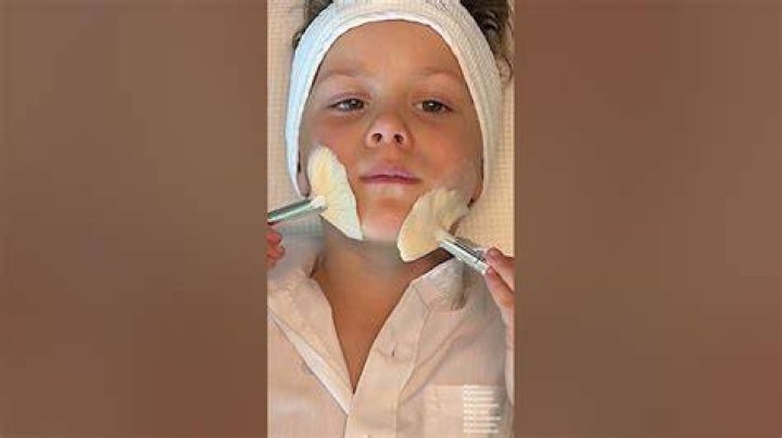 Son gives mom facial