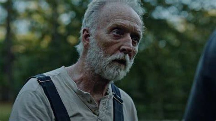 Tobin Bell as Father Zabriskie in Christmas with the Kranks